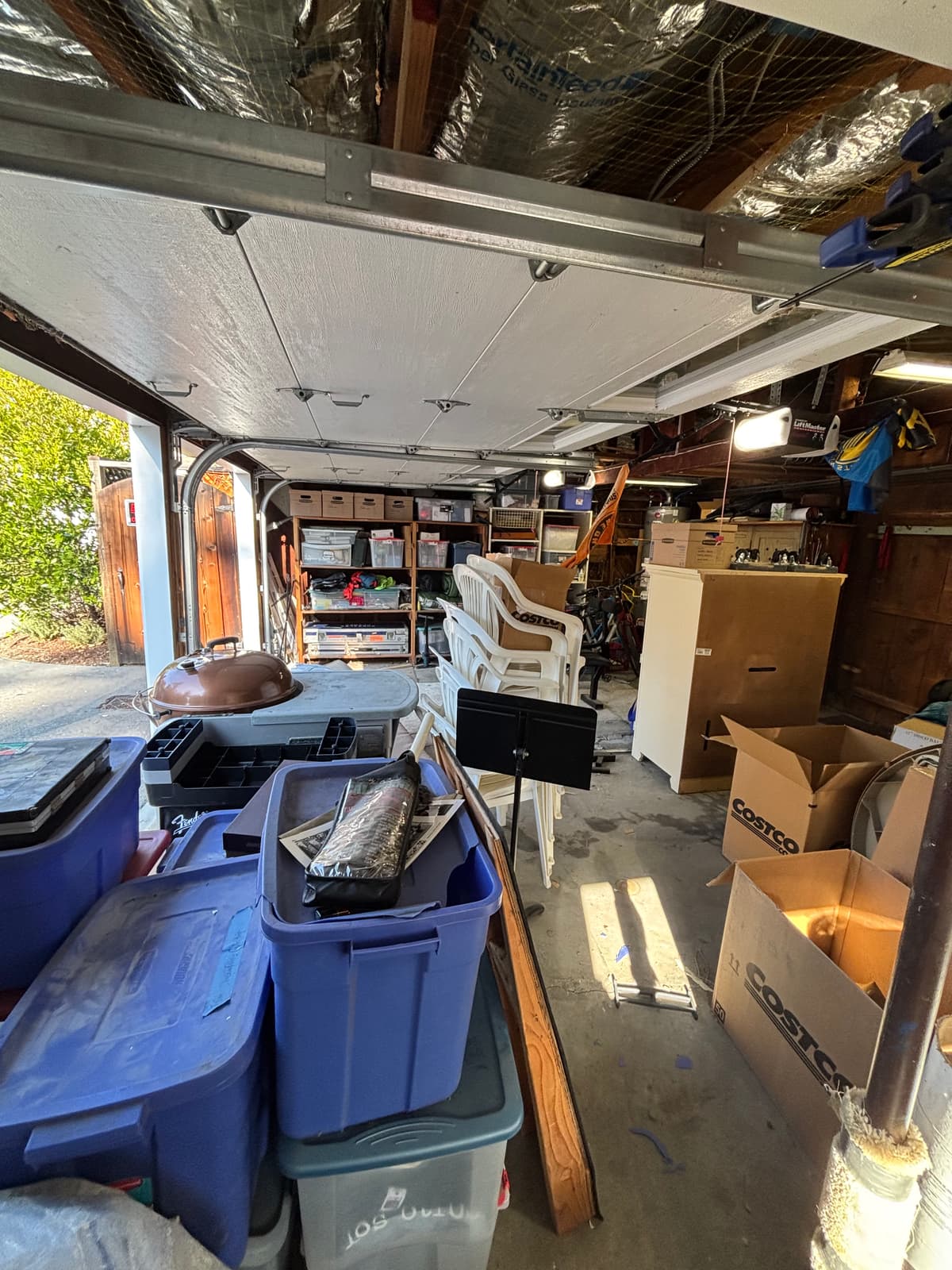 Cluttered garage before consultation